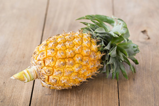pineapple on the wood  background