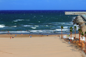 Sandy beach and storming sea. Valencia, Spain