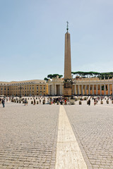 Tourists at Saint Peters Square in Vatican in Italy