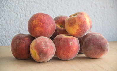 Group of fresh peaches bought on local market.