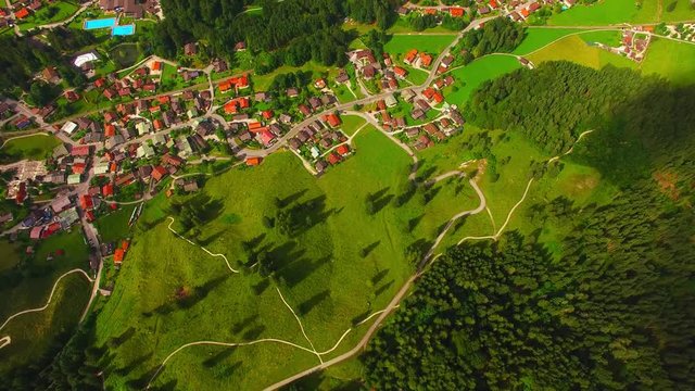 Camera flight over alpine landscape under Zugspitze peak. Grainau valley near Garmisch Partenkirchen. Amazing destination for hiking, skiing and mountaineering in Bavaria, Germany, Central Europe.