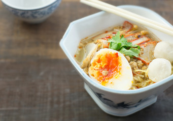 yellow noodle with red roasted pork