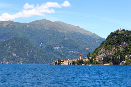 View towards lakeside village Varenna at Lake Como with mountains in Lombardy, Italy