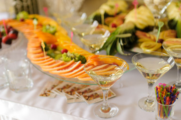 banquet table with different fruits