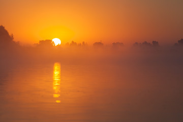 red sunset over river