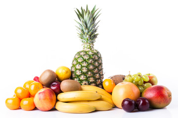 Fresh fruits.  Assortment of exotic fruits isolated on white