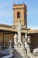 Obraz premium old cross carved in stone on a grave