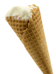 Vanilla ice cream in a waffle cup on white background.
