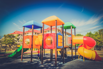 Fototapeta na wymiar Colorful playground on yard in the park, Playground for children