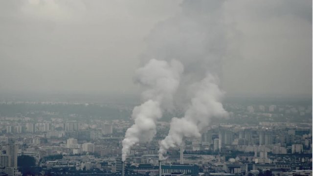 smoke from an industrial chimney in paris