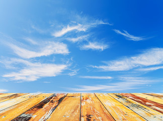 Wood floor top on blue sky background, Cloudy blue sky and wood