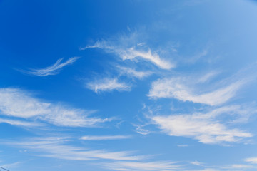 Naklejka na ściany i meble Blue sky and white wave clouds, blue sky for background.