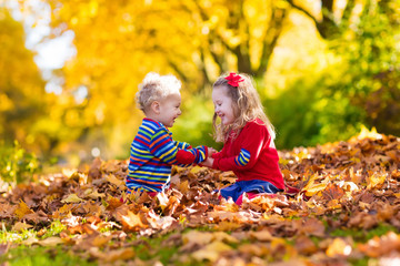 Kids playing in autumn park