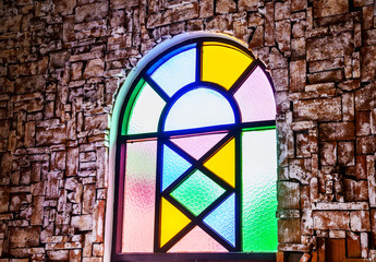 Stained glass window of colored glass