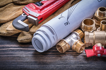 Protective gloves monkey wrench blueprints brass plumbing fittin