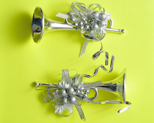 Silver trumpets to decorate a Christmas tree isolated against a