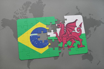 puzzle with the national flag of brazil and wales on a world map background.
