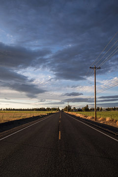 Empty Road Under A Dark And Stormy Sky