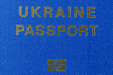 Fototapeta na wymiar Ukrainian biometric passport cover macro