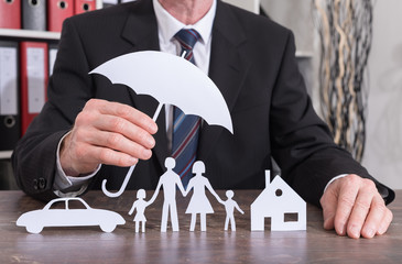 Family, house and car insurance concept