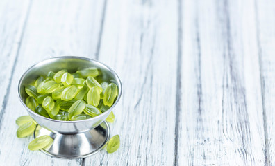 Portion of gummy candy (with lime taste)