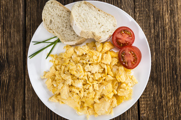 Plate with scrambled Eggs (close-up shot)