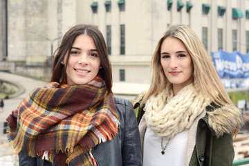 Portrait of two young woman. Urban concept.