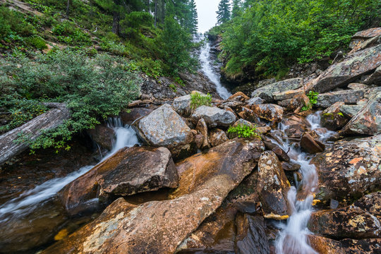 Waterfall on a mountain stream in Khamar-Daban ridge