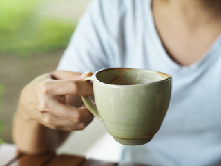 Coffee in hand.