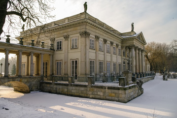  The Lazienki palace in Lazienki Park. Winter landscape with snow.