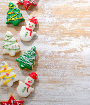 Christmas cookies  on white wooden table.