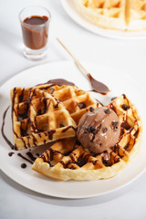 waffles with chocolate ice cream and chocolate sauce
