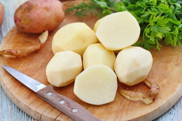Raw peeled potatoes