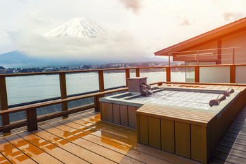 Japanese open air hot spa onsen with a beautiful view of the mountain Fuji