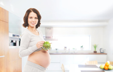 Woman expecting a baby. Pregnant lady at home