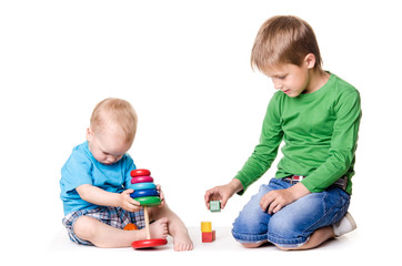 children playing together on white background