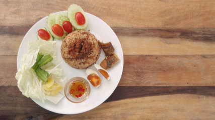rice with fried mackerel boil egg shrimp paste chili sauce and vetgetable and fish fry  original thai food