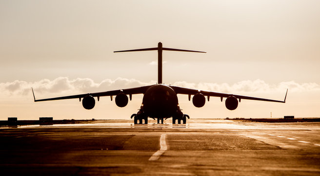 Fototapeta Large military cargo plane silhouette
