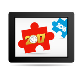 happy new year 2017. word puzzle on tablet
