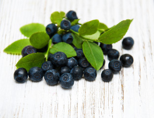 Blueberries on a old wooden background
