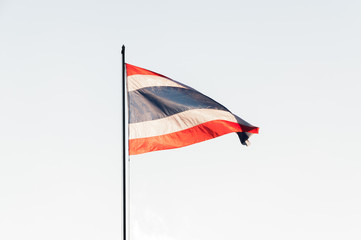 Thailand flag on  top of the pole in a windy day dusk