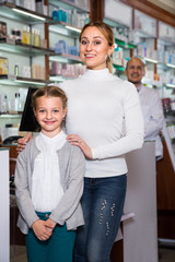 pharmacist  helping customers
