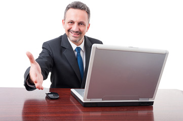 Confident businessman doing a handshake