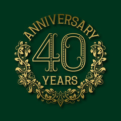Golden emblem of fortieth years anniversary. Celebration patterned logotype with shadow on green.