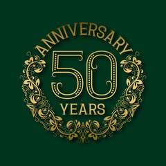 Golden emblem of fiftieth years anniversary. Celebration patterned logotype with shadow on green.