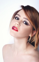 Fototapeta premium Beauty. Beautiful Young Female touching Her Skin. Portrait isolated on White Background. Healthcare. Perfect Skin. Beauty Face.