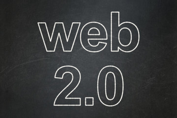 Web development concept: Web 2.0 on chalkboard background