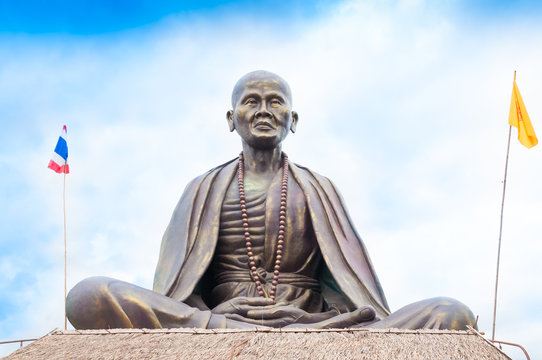 big statue of kruba Siwichai, Thai monk statue in temple lanna Northern Thailand