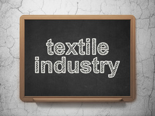 Manufacuring concept: Textile Industry on chalkboard background
