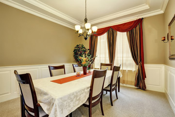 Amazing dining room interior with nice curtains.